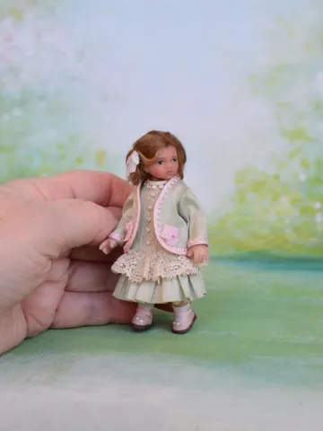 Miniature girl doll for Victorian dollhouse in 1/12 scale. $180.00
