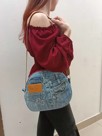 Unusual cute handmade denim bag with pockets - adjustable strap $75.00