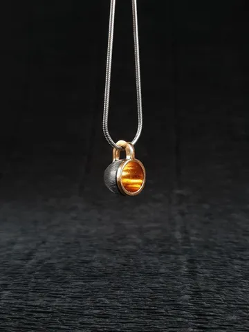 Pendant cup of coffee made of silver with gold plating. $62.00