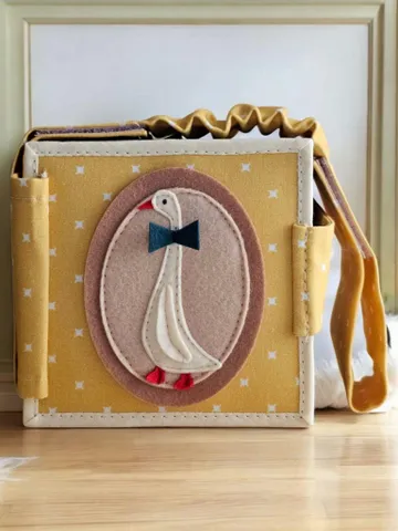 Sensory toys for babies Montessori quiet book travel busy book for baby 6 to 12 months One Silly Goose first birthday gift Kinderkrama $70.00
